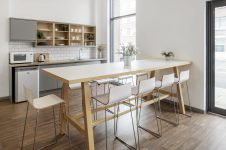 Room with table and chair at Portland Green Student Village