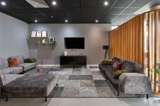 Room with sofa at 17a Christchurch Road