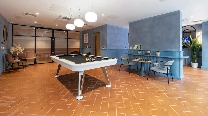 Room with table at Aster House